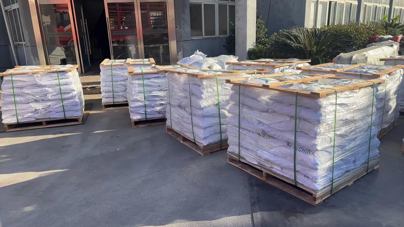 Palletized bags of TR-T 20×20 ceramic tumbling media prepared for a bulk order
