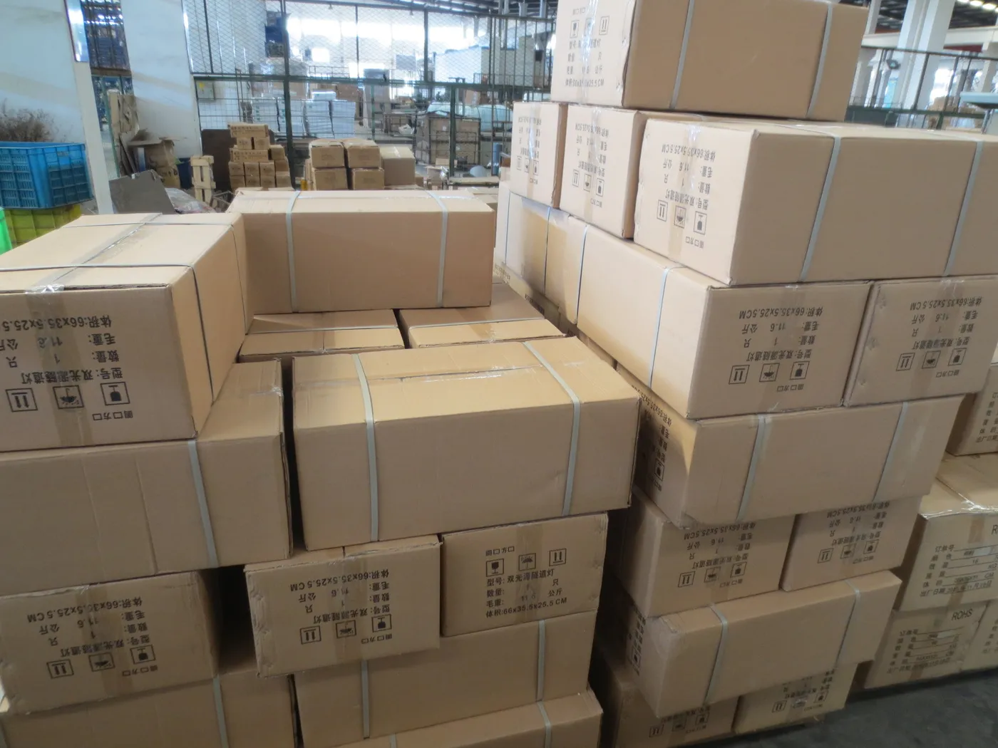 Cartons of industrial LED flood lights prepared for packing and shipment