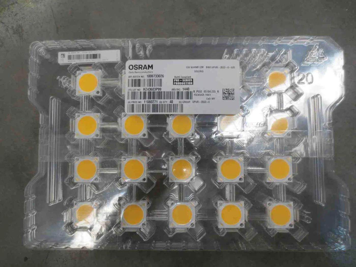 LED component packaging checked during industrial flood light production