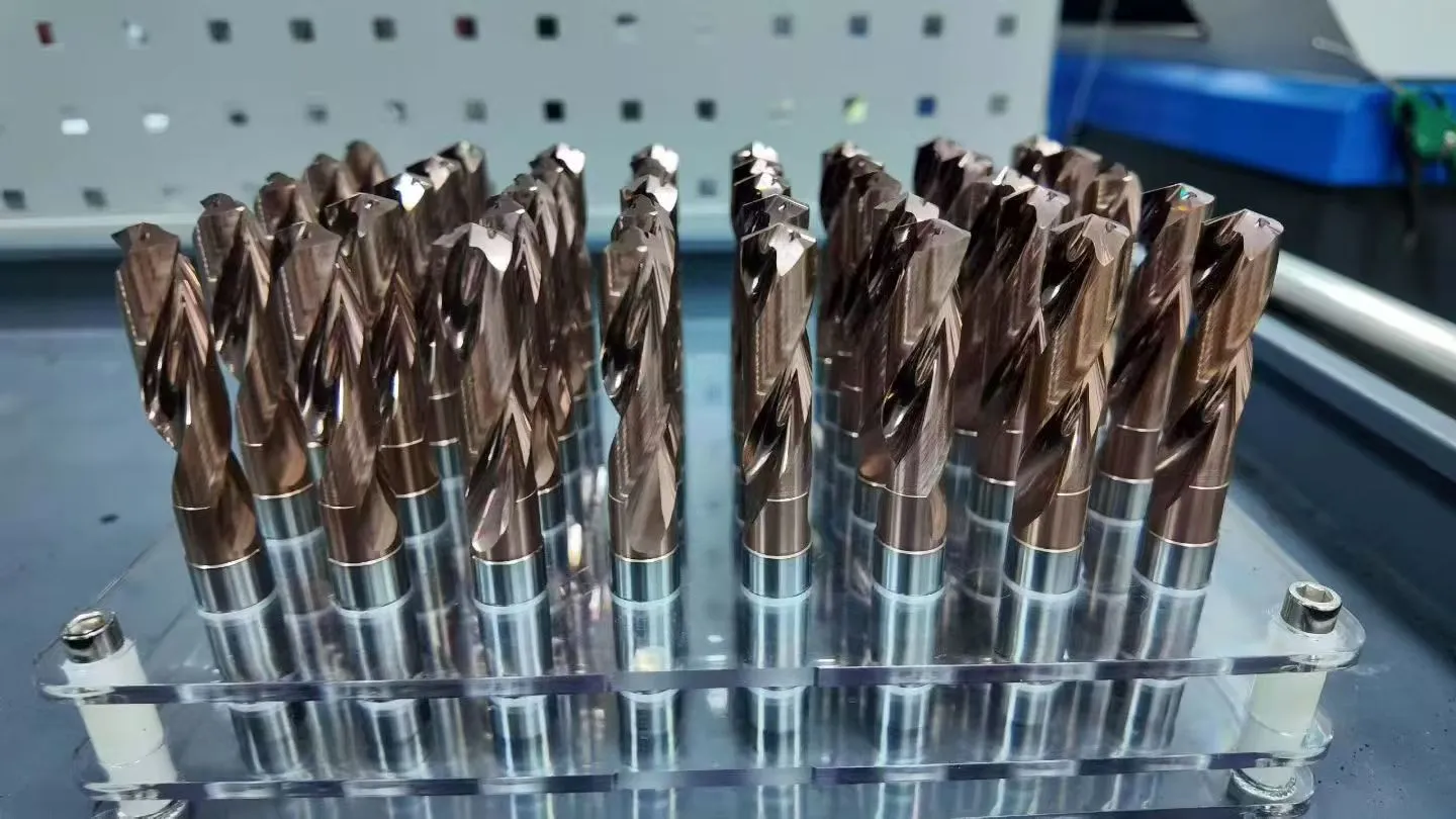 Batch of special cutting tools with varied end geometries and colored surface finish